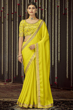 Load image into Gallery viewer, Intricate Chinon Fabric Party Wear Border Work Saree In Yellow Color
