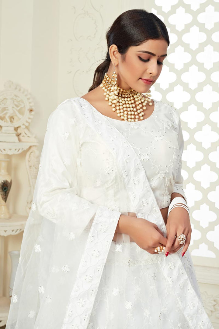 Embroidery Work Sangeet Wear Stylish Lehenga Choli In Off White Color Net Fabric