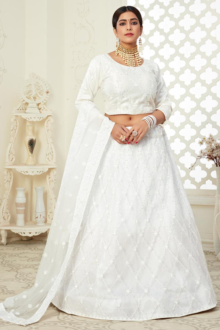 Embroidery Work Sangeet Wear Stylish Lehenga Choli In Off White Color Net Fabric