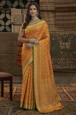 Load image into Gallery viewer, Bewitching Weaving Work On Mustard Color Saree In Art Silk Fabric
