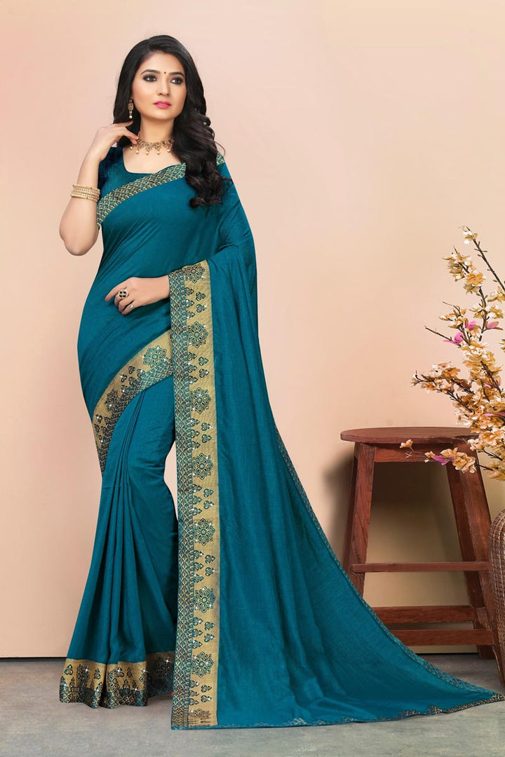 Teal Color Daily Wear Fancy Art Silk Fabric Lace Work Saree