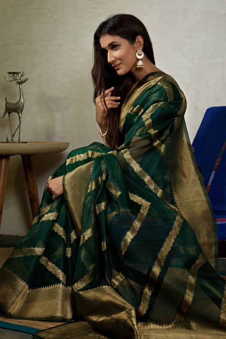 Pleasant Organza Fabric Weaving Work Saree In Dark Green Color