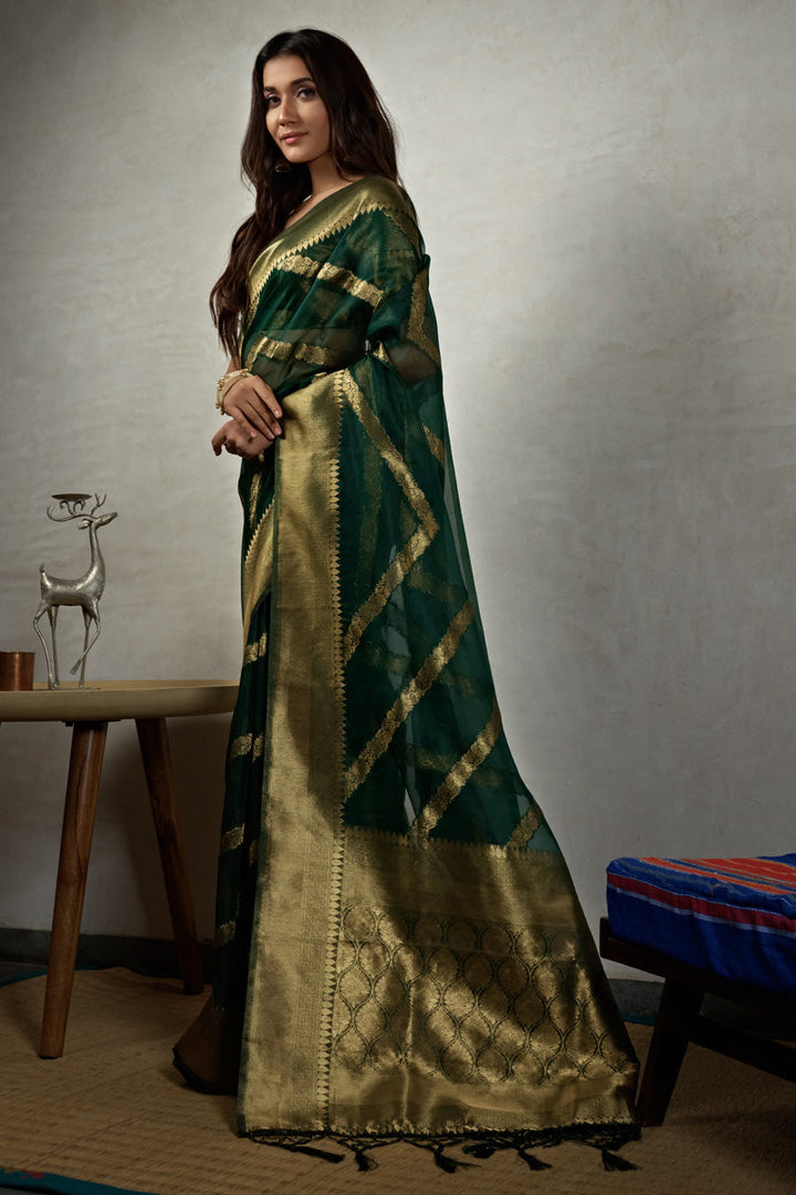 Pleasant Organza Fabric Weaving Work Saree In Dark Green Color