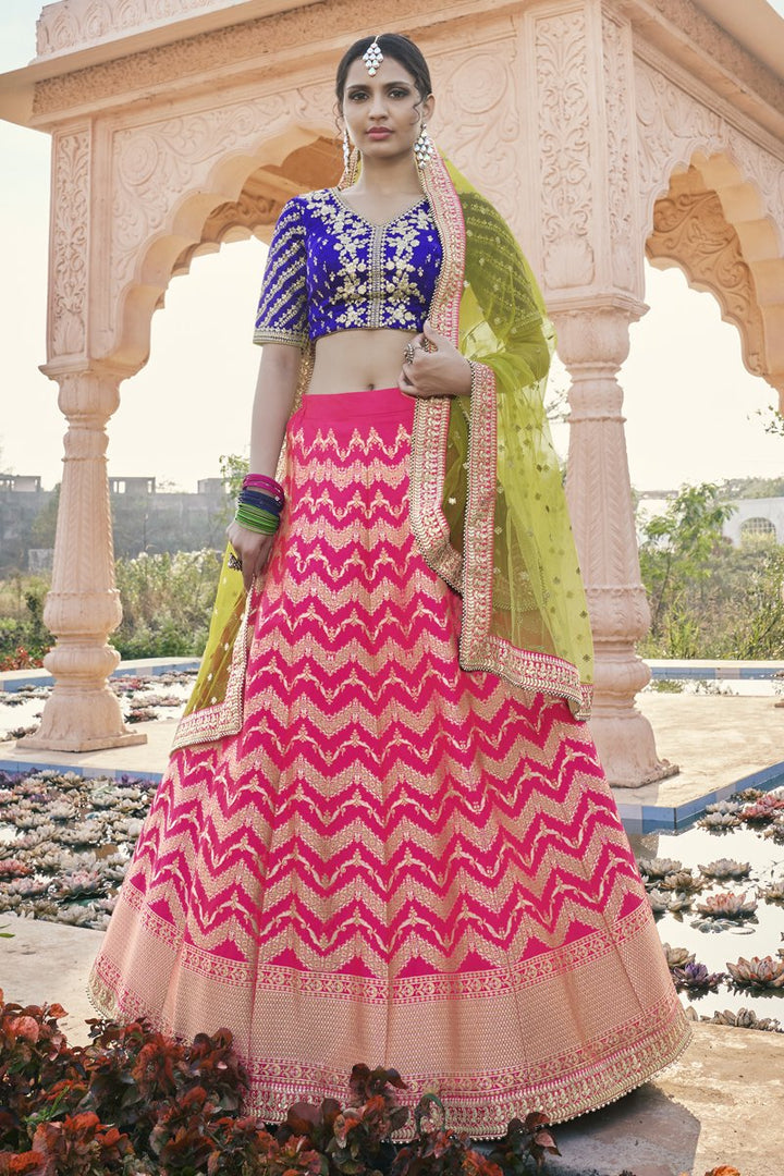 Reception Wear Silk Fabric Rani Color Embroidered Lehenga Choli
