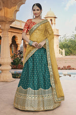 Load image into Gallery viewer, Wedding Wear Teal Color Embroidered Lehenga Choli In Silk Fabric

