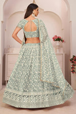 Load image into Gallery viewer, Sangeet Wear Sea Green Color Lehenga Choli With Dazzling Embroidered Work In Net Fabric
