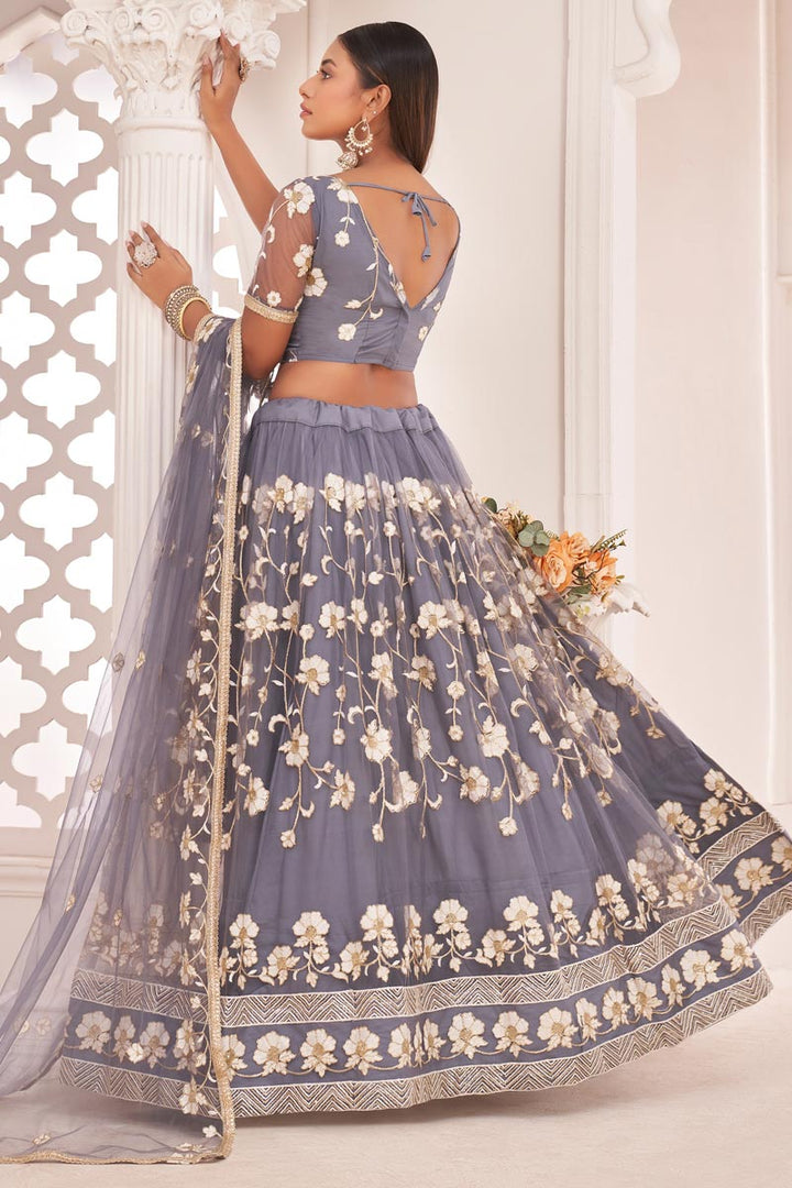 Lavender Color Sangeet Wear Net Fabric Spectacular Embroidered Lehenga