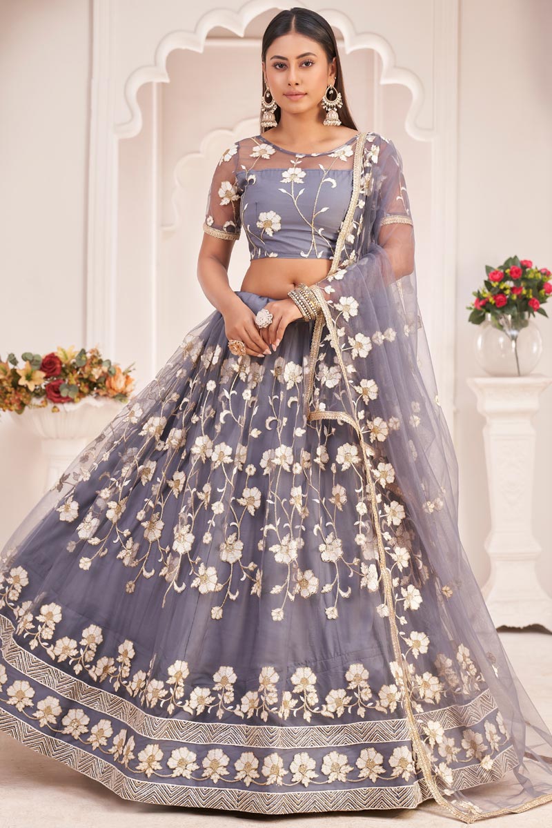 Lavender Color Sangeet Wear Net Fabric Spectacular Embroidered Lehenga