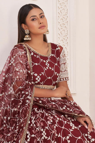 Net Fabric Sangeet Wear Maroon Color Striking Embroidered Lehenga