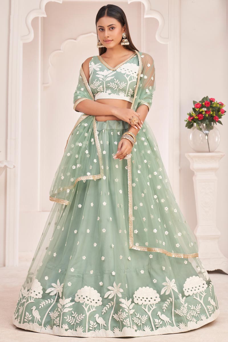 Sea Green Color Sangeet Wear Net Fabric Flamboyant Embroidered Lehenga