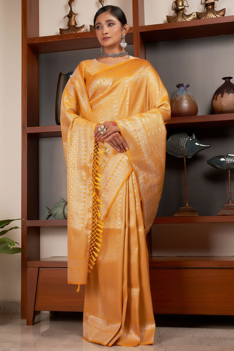 Weaving Work On Glamorous Saree In Yellow Kanjivaram Silk