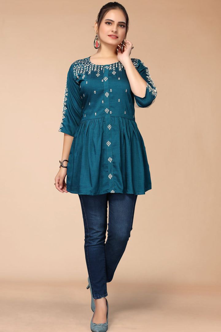 Rayon Fabric Teal Color Short Kurti With Fascinating Embroidered Work