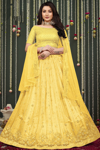 Incredible Embroidered Work On Net Fabric Yellow Color Lehenga