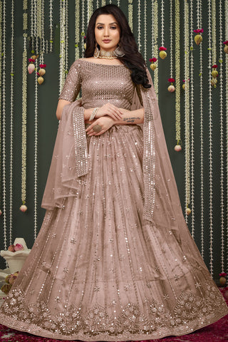 Tempting Net Fabric Chikoo Color Lehenga With Embroidered Work