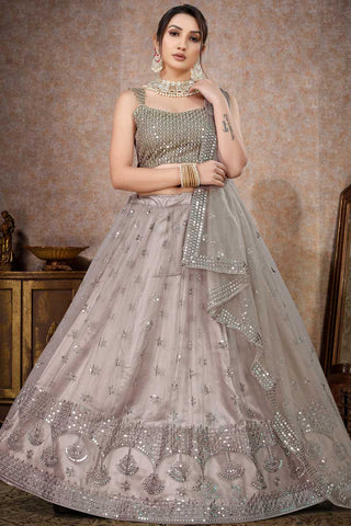 Beige Color Net Fabric Appealing Sequins Work Lehenga