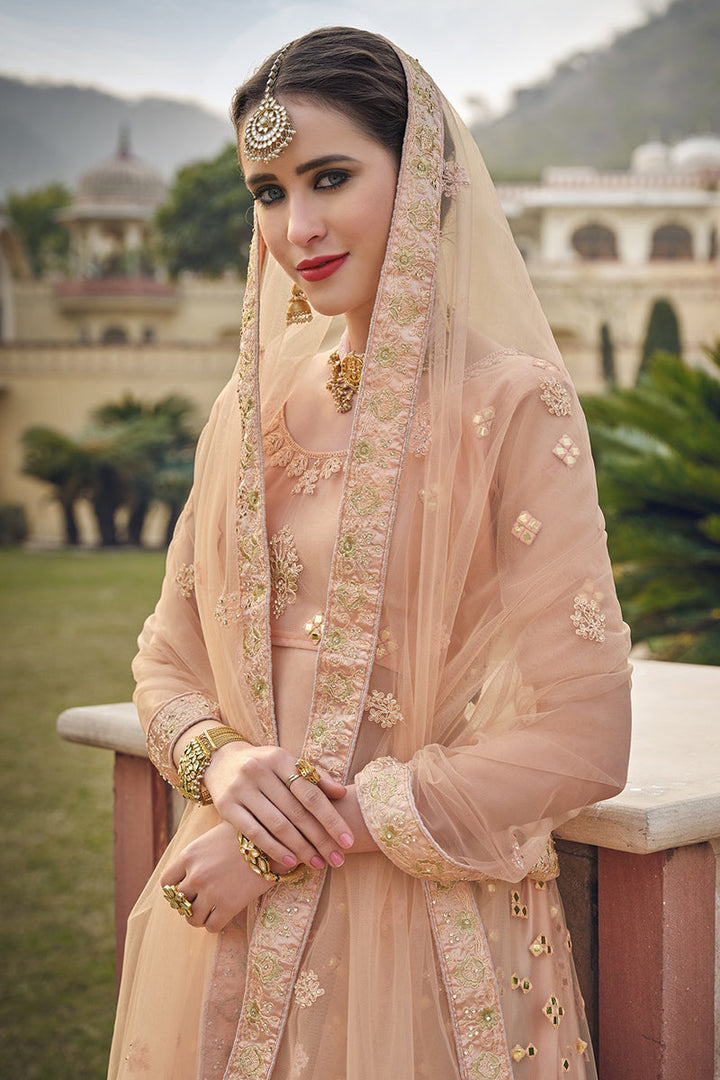 Net Fabric Designer Wedding Lehenga Choli In Peach Color
