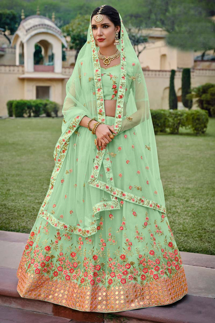 Sea Green Color Sangeet Wear Lehenga With Wonderful Embroidered Work In Net Fabric