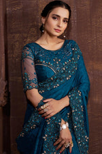 Load image into Gallery viewer, Blue Color Embroidered Border Work On Chinon Fabric Party Wear Intriguing Saree
