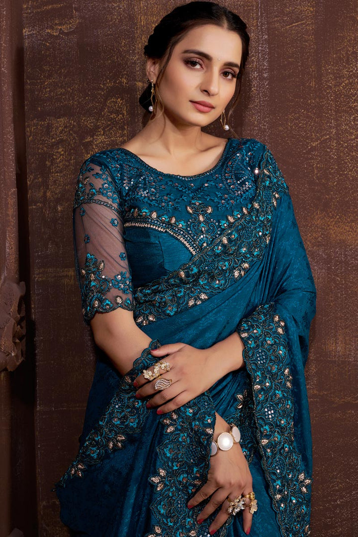 Blue Color Embroidered Border Work On Chinon Fabric Party Wear Intriguing Saree