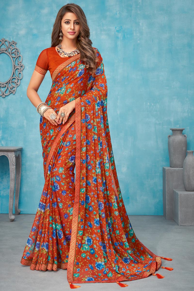 Chiffon Fabric Rust Color Regular Wear Floral Printed Saree