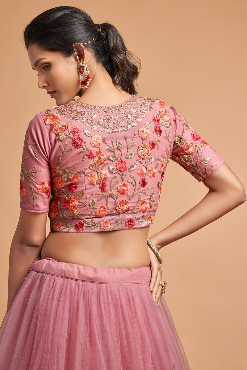 Sangeet Wear Net Fabric Classic Pink Color Lehenga With Embroidered Designs