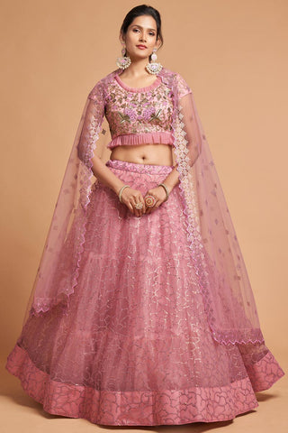 Sangeet Wear Pink Color Net Fabric Mesmeric Lehenga With Embroidered Work