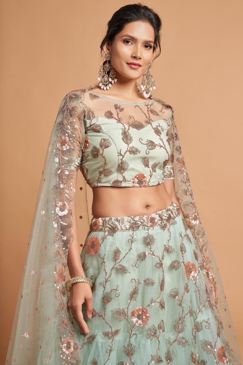 Net Fabric Sangeet Wear Sea Green Color Provocative Lehenga With Embroidered Work