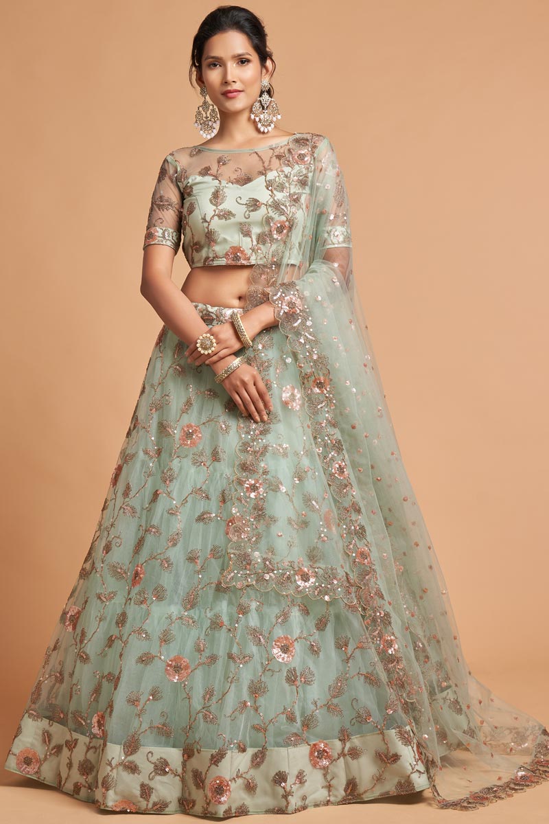 Net Fabric Sangeet Wear Sea Green Color Provocative Lehenga With Embroidered Work