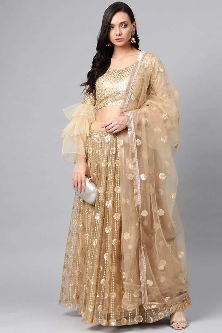 Sangeet Wear Beige Color Sequins Work Lehenga Choli In Net Fabric