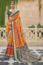 Load image into Gallery viewer, Patola Style Silk Festive Wear Mustard Color Printed Designer Saree
