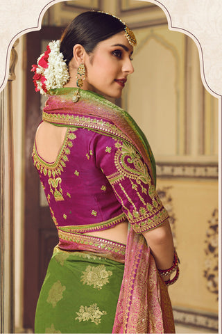 Alluring Green Banarasi Silk Saree With Designer Blouse