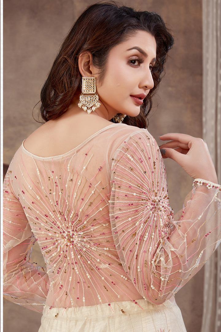 Off White Color Attractive Net Fabric Sharara Top Lehenga In Function Look