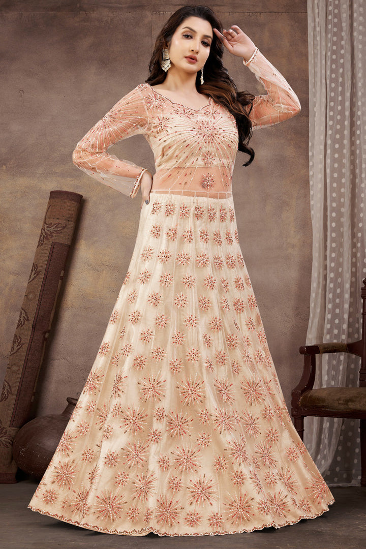 Off White Color Attractive Net Fabric Sharara Top Lehenga In Function Look