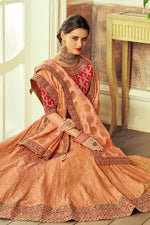 Load image into Gallery viewer, Brocade Fabric Peach Color Wedding Wear Coveted Lehenga With Embroidered Designs
