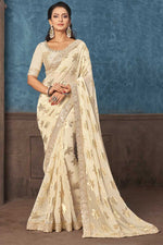 Load image into Gallery viewer, Georgette Fabric Cream Color Party Style Phenomenal Saree
