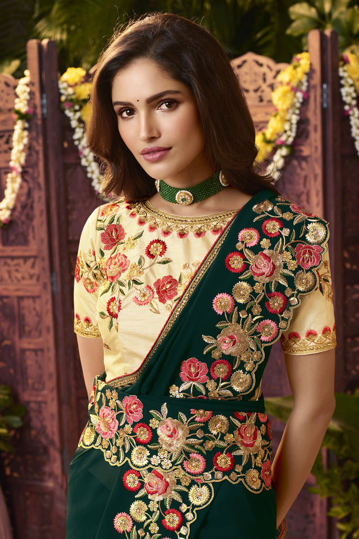 Charming Dark Green Color Georgette Fabric Saree With Embroidered Work Featuring Vartika Singh
