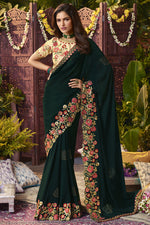 Load image into Gallery viewer, Charming Dark Green Color Georgette Fabric Saree With Embroidered Work Featuring Vartika Singh
