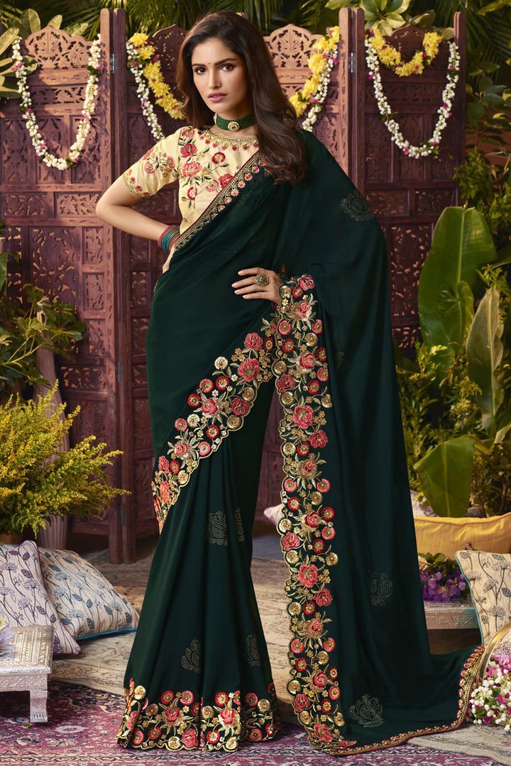 Charming Dark Green Color Georgette Fabric Saree With Embroidered Work Featuring Vartika Singh