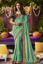 Load image into Gallery viewer, Sea Green Color Bright Fancy Fabric Saree With Embroidered Work Featuring Vartika Singh
