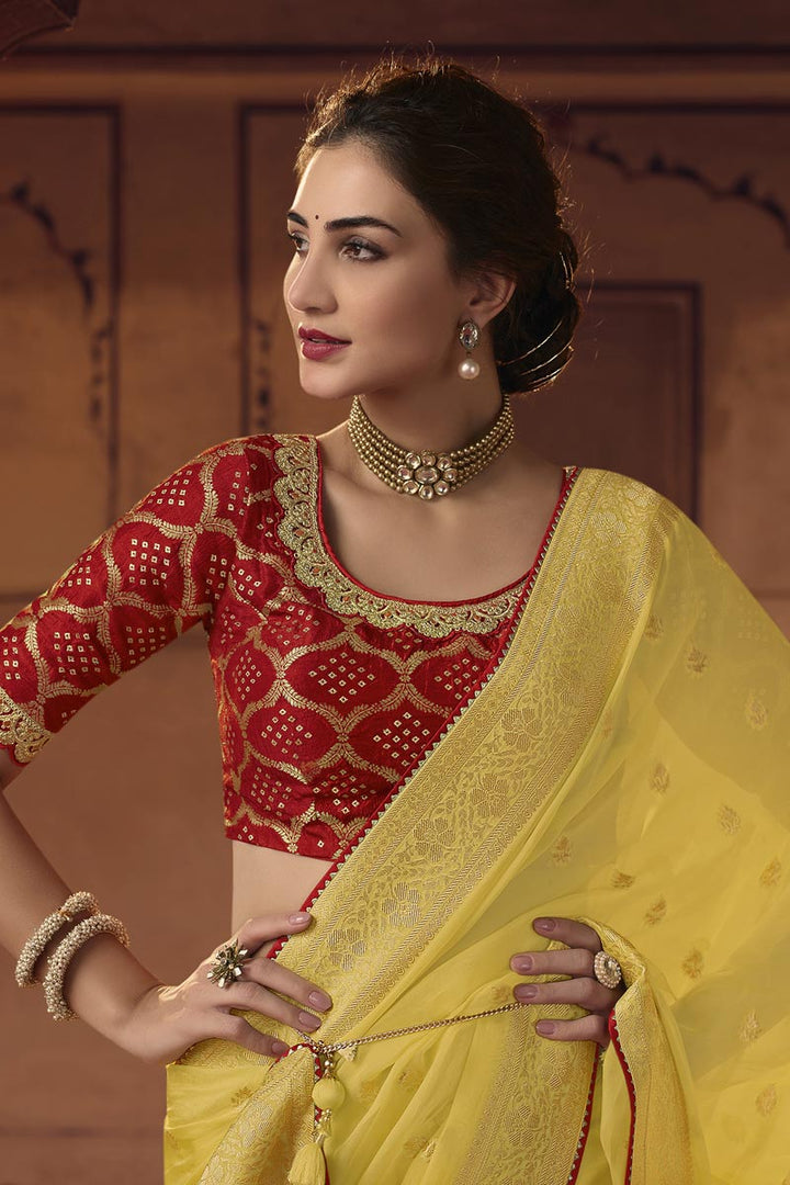 Organza Fabric Yellow Color Saree With Winsome Embroiderd Work