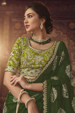 Load image into Gallery viewer, Tempting Viscose Fabric Dark Green Color Saree With Embroiderd Work
