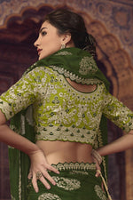 Load image into Gallery viewer, Tempting Viscose Fabric Dark Green Color Saree With Embroiderd Work
