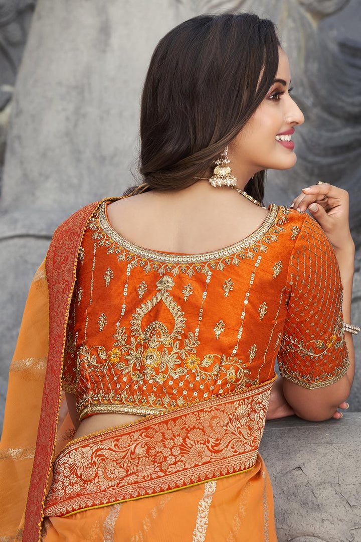 Attractive Embroidered Orange Reception Wear Saree