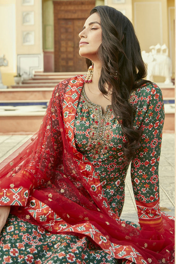Exclusive Green Color Silk Patola Printed Readymade Gown With Dupatta