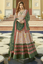 Load image into Gallery viewer, Cream Color Exquisite Patola Printed Silk Readymade Gown With Dupatta
