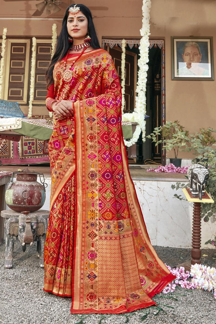 Banarasi Silk Fabric Fancy Wedding Wear Patola Style Saree In Red Color