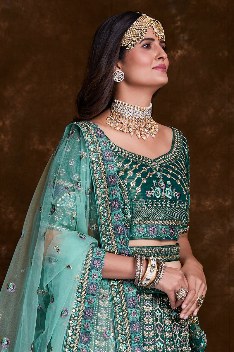 Embroidered Art Silk Wedding Wear Lehenga In Teal With Ravishing Blouse