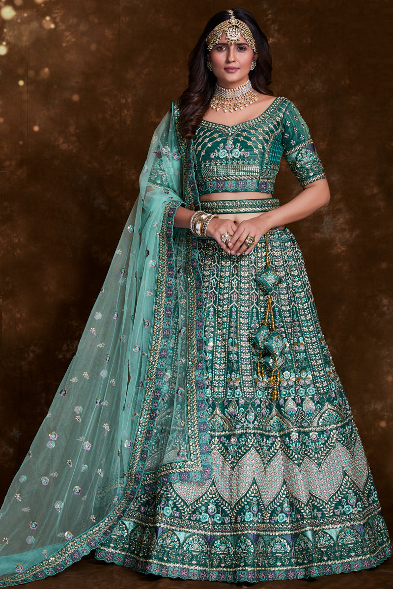 Embroidered Art Silk Wedding Wear Lehenga In Teal With Ravishing Blouse