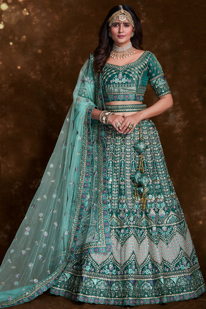 Embroidered Art Silk Wedding Wear Lehenga In Teal With Ravishing Blouse