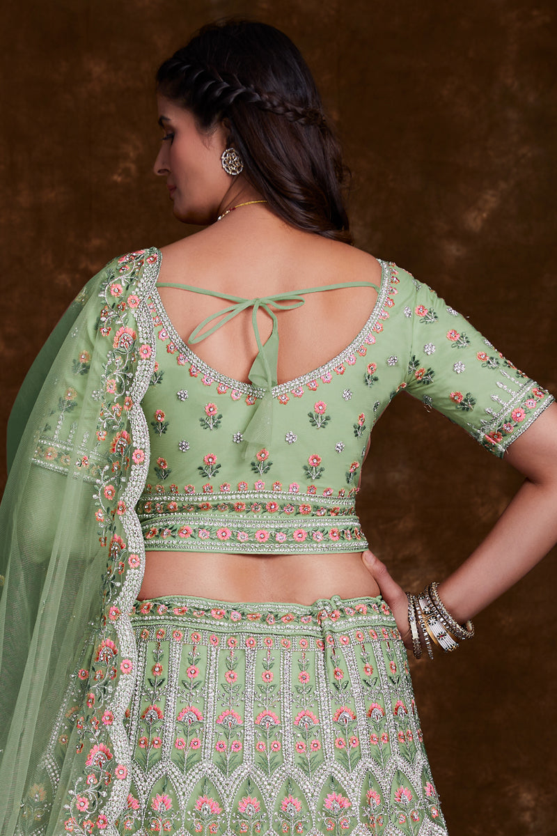 Embroidered Wedding Wear Lehenga Choli In Green Net Fabric